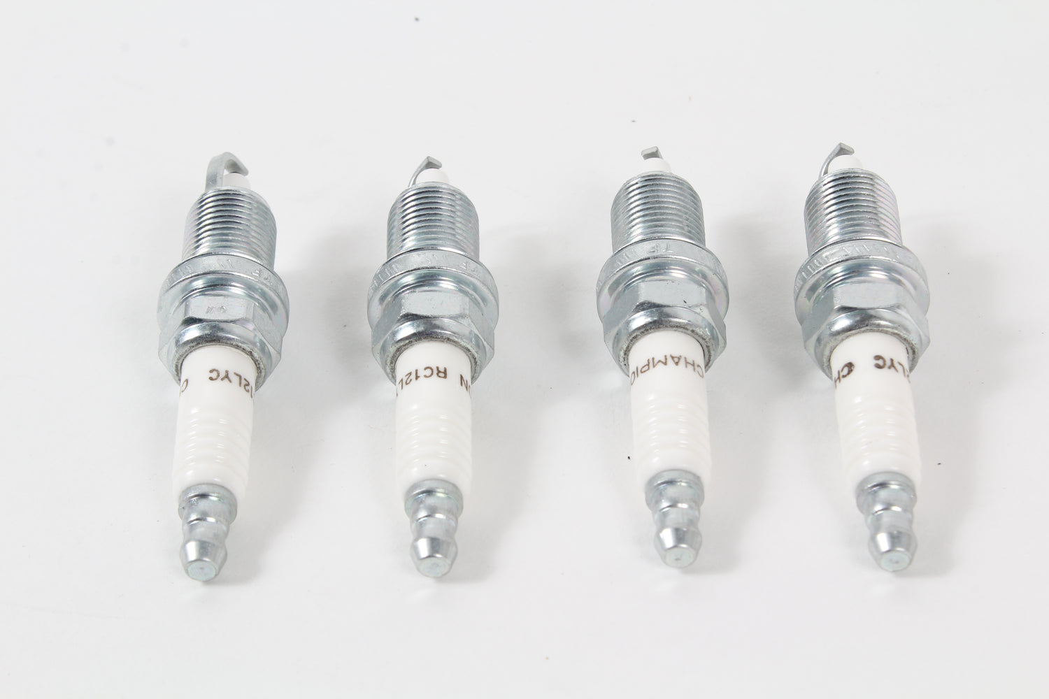 4 Pack of Genuine Champion RC12LYC Copper Plus Spark Plugs 412